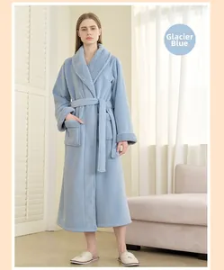 Detailed view of thick glacier blue plush robe with wide lapel and belted waist design