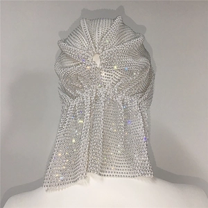Detailed macro view of the silver rhinestone mesh headpiece on a mannequin head