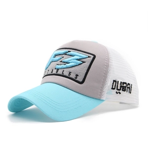 Detail of F3 STABLES embroidery on three-tone mesh trucker hat with Dubai side text