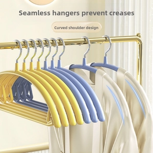 Contoured shoulder design hangers with anti-slip coating to prevent clothing bumps