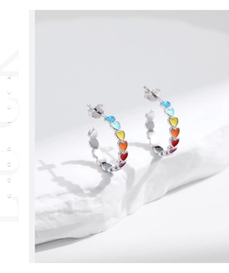 Detailed view of S925 sterling silver C-shaped earrings with colorful enamel hearts