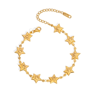 Detail view of gold star bracelet showing S.steel engraving on the adjustable extension chain