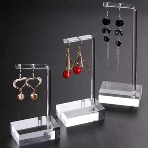 Three-piece acrylic earring display stands in transparent L-shaped tiered design