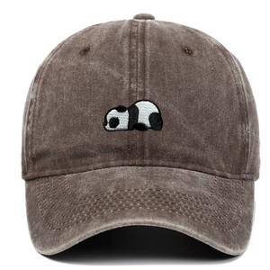 Detail of panda embroidery on dark coffee washed cotton vintage baseball cap