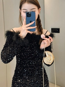 Luxurious gold shell-shaped evening clutch bag with metal sphere chain strap for women