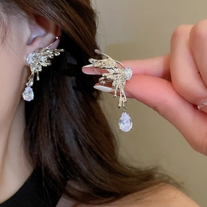 Silver butterfly wing ear cuff with liquid metal tassels and zircon drop detail