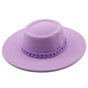 Detail of wool felt boater hat featuring a stylish matching matte chunky chain link