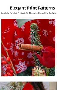 Close-up of Christmas bouquet with red roses, pine branches and snowflake wrapping paper