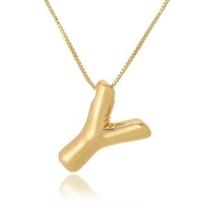 Detailed shot of a 3D puffy gold-toned capital letter Y pendant with a slim chain
