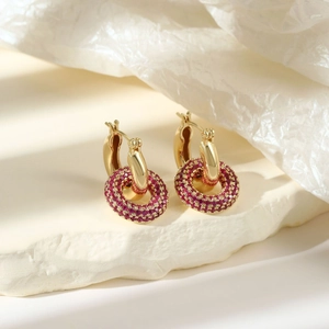 Elegant gold hoop earrings with sparkling pink pave crystal round pendant on stone base