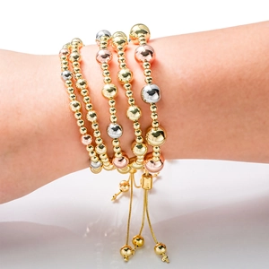 Adjustable tri-color copper bead bracelet for women featuring gold silver and rose gold tones
