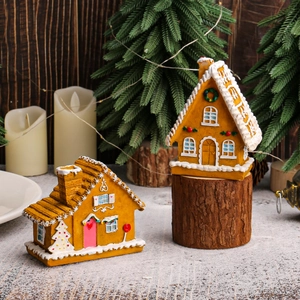 LED lighted resin gingerbread house Christmas village decoration for festive tabletop display