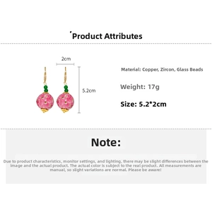 Detail of pink floral glass earrings with copper and zircon material specifications