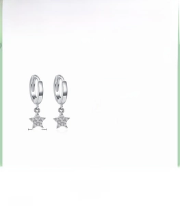 Detailed macro view of S925 sterling silver star hoop earrings with sparkling zirconia