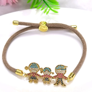 Adjustable brown Milan cord bracelet with 18k gold plated cartoon family charms and zircons