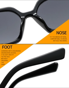 Detail view of comfortable nose pads and ergonomic temples of black oval sunglasses