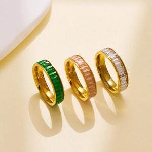 Three-color emerald cut zircon stackable rings in gold plated stainless steel