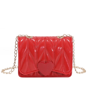 Mini heart-shaped red silicone crossbody bag with gold chain strap for kids