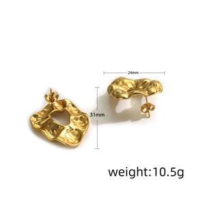 Detailed view of gold irregular textured earrings with size and weight measurements