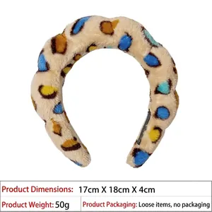 Detailed view of polka dot sponge headband showing dimensions 17cm by 18cm and 4cm thickness