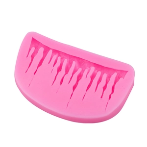 Pink silicone icicle mold for fondant cake borders and Christmas baking DIY decoration