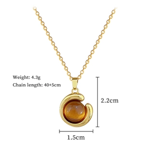 Macro detail of amber crescent pendant necklace with precise dimensions and weight specs