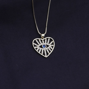 Golden heart necklace featuring an evil eye pendant with blue zircon stone and crystal inlay