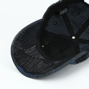 Deep blue washed cotton baseball cap with vintage distressed texture and interior label detail