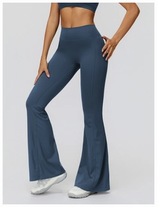 Close-up of high-waist yoga flare pants in misty blue featuring seamless stitching