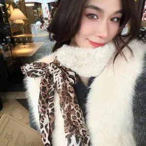 Vintage leopard print faux fur scarf with bow tie for elegant winter neck warming