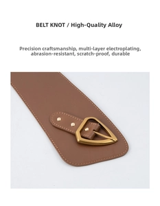 Detail of genuine leather belt with premium gold alloy triangle buckle and polished rivets