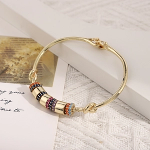Elegant 18K gold plated geometric bangle featuring colorful cubic zirconia sliding charms