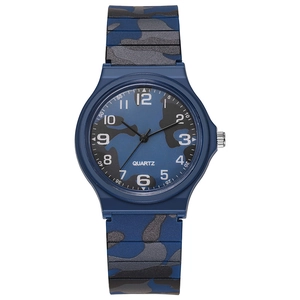 Macro view of blue camouflage dial with clear Arabic numerals on quartz student watch