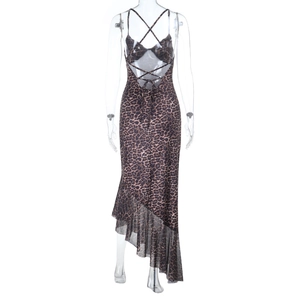 Detail of sexy backless leopard print dress featuring crisscross ties and asymmetrical hem
