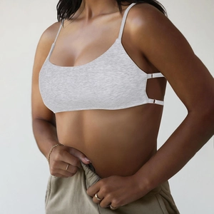 Close-up of light grey ribbed knit crop top showing detailed fabric texture and fit