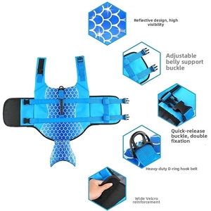 Detail view of blue fish scale dog life jacket with reflective strips and sturdy buckles