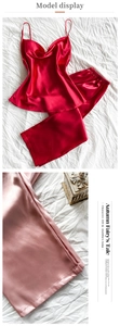 Detail of silk-satin pajama sets featuring red and pink camisole and wide-leg trousers