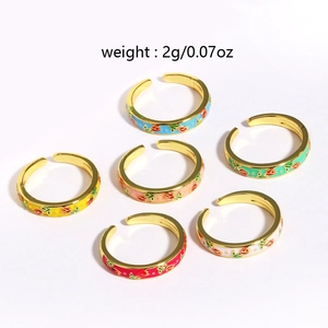 Minimalistische offene Blumenringe in sechs Emaillefarben mit Goldbeschichtung