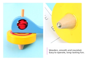 Detail of wooden spinning top with red pull cord and blue handle launcher mechanism