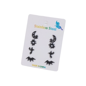 Set of 4 black stainless steel stud earrings featuring moon, sun, and star designs