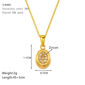 Detail showing 18k gold plated stainless steel oval pendant with inlaid zircon stones