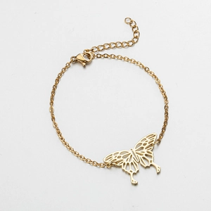 Detailed close-up of golden stainless steel bracelet with hollow butterfly pendant and clasp
