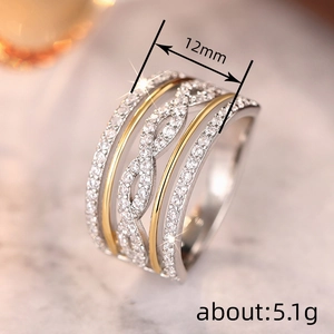 Zweifarbiger Unendlichkeitsring mit Zirkonia-Pavé in Gold- und Silberoptik