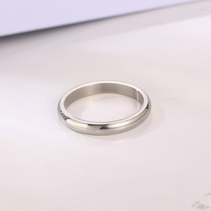 Macro detail showing the polished 3mm stainless steel domed ring surface and smooth finish