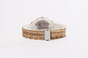Detailed back view of fashion watch showing wood grain texture strap and metal buckle