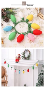 Macro shot of colorful hand-crocheted mini Christmas light bulb ornaments for festive decor