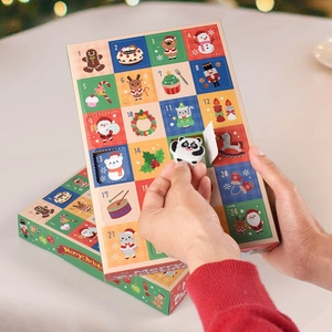 Christmas 24-day countdown calendar box featuring a panda eraser being revealed from a window