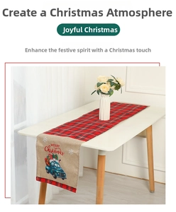 Close-up of linen Christmas table runner with red-black plaid and blue vintage truck print