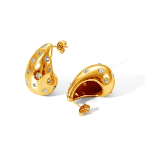Golden teardrop earrings for women with white zircon crystals in a minimalist style