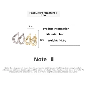 Detail showing irregular wavy triple-layer silver needle hoops with 3cm measurement